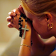 Susy Vazquez prays before a shadow that has formed what many think is the silhouette of Joseph and the Virgin Mary standing over the baby Jesus at St. Brendan Catholic Church’s Adoration Chapel on Sept. 21, 2007, in Miami. (Joe Raedle/Getty Images)